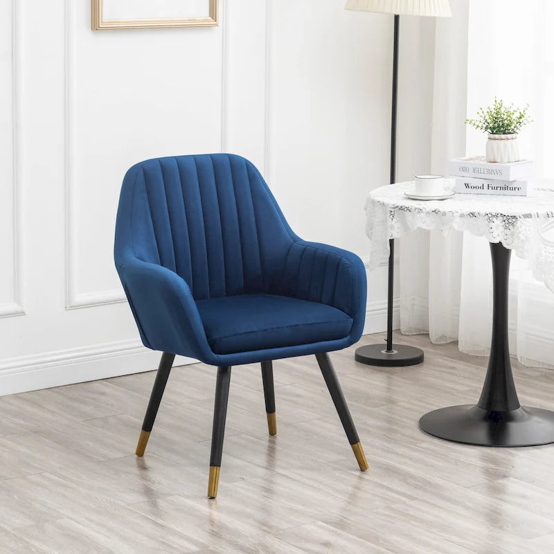 Sillón decorativo Tuchico tapizado en terciopelo contemporáneo