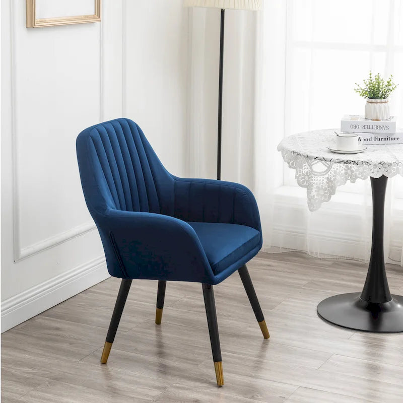 Sillón decorativo Tuchico tapizado en terciopelo contemporáneo
