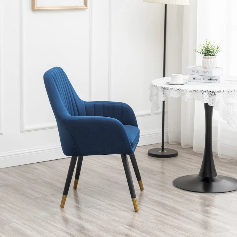 Sillón decorativo Tuchico tapizado en terciopelo contemporáneo