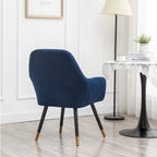 Sillón decorativo Tuchico tapizado en terciopelo contemporáneo