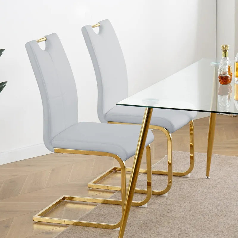 Sillas de comedor modernas de piel sintética con asiento acolchado y patas de metal dorado