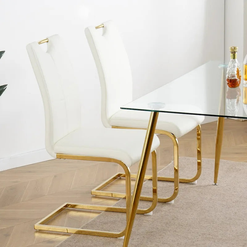 Sillas de comedor modernas de piel sintética con asiento acolchado y patas de metal dorado